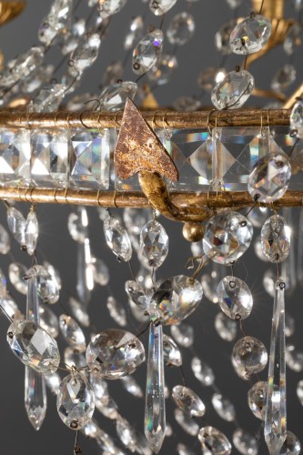 Antiquités - Grand lustre italien en fer doré et cristaux 18e siècle