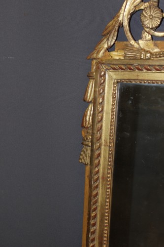 Miroirs, Trumeaux  - Miroir Louis XVI en bois sculpté et doré