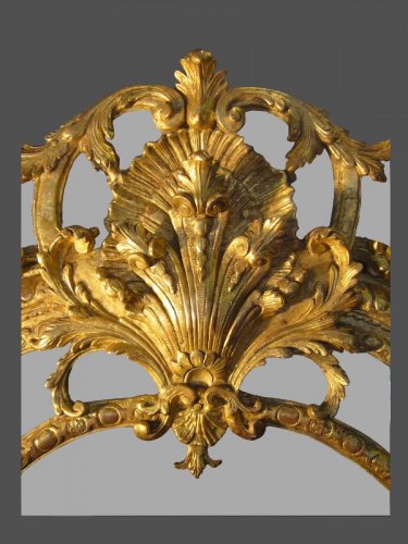 Miroir en bois doré et sculpté d'époque de la Régence - Antiquités Rigot et Fils