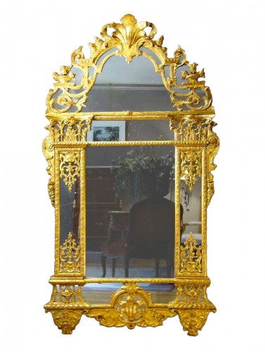 Miroir en bois sculpté et doré d'époque Louis XIV