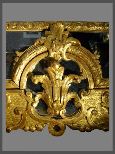 Antiquités - Miroir en bois sculpté et doré d'époque Louis XIV