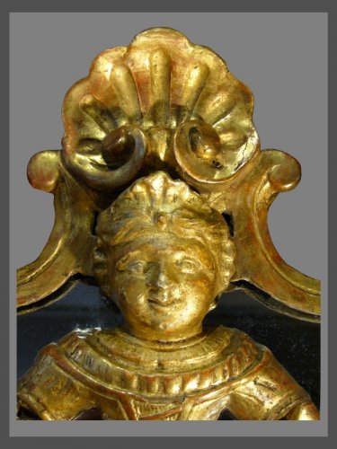 Miroir à parecloses en bois sculpté et doré d'époque Régence - Antiquités Rigot et Fils