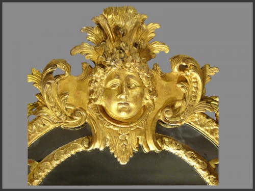 Miroir en bois sculpté et doré d'époque Régence - Miroirs, Trumeaux Style Régence