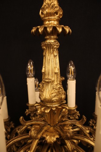 Antiquités - Lustre en bronze doré à 18 feux, époque Napoléon III