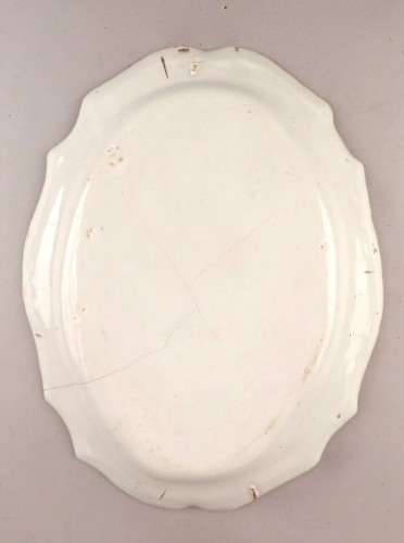 Céramiques, Porcelaines  - Plat en faïence à la muse, Est de la France, début XIXe