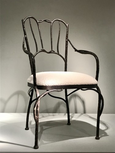 Antiquités - Série de quatre fauteuils en fer noirci