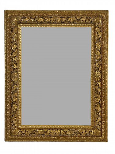 Grand miroir vénitien du 19e siècle en bois finement sculpté et doré