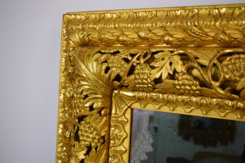Grand miroir vénitien du 19e siècle en bois finement sculpté et doré - Brozzetti Antichità
