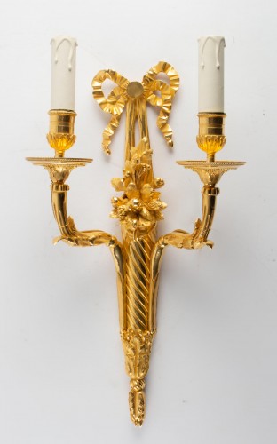 XIXe siècle - Suite de quatre appliques en bronze doré