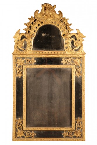 Miroir Régence en bois sculpté et doré