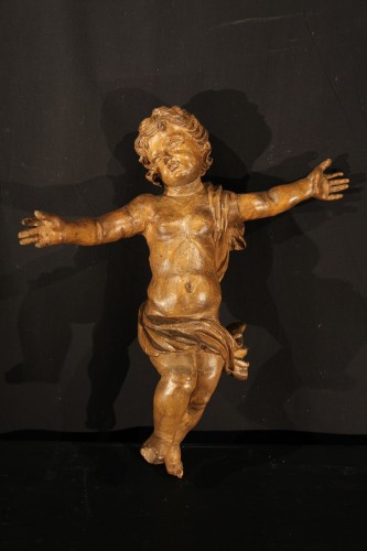 Paire d’angelots en bois de tilleul sculpté et patiné. Epoque XVIIe - Chatelan Antiquités