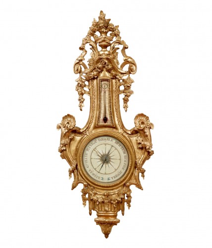 Baromètre-thermomètre en bois sculpté, ajouré et doré