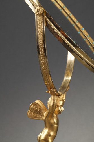 Antiquités - Miroir Charles X en cristal et bronze doré à système musical