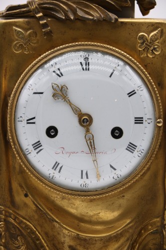 Antiquités - Pendule en bronze doré et ciselé à la « palme du souvenir »