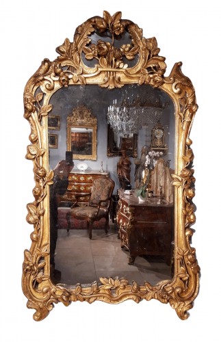 Miroir Louis XV à parcloses en bois doré