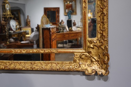 XVIIIe siècle - Grand miroir Régence à parcloses en bois doré d'époque début XVIIIe