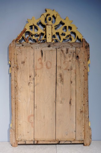 Miroir Louis XVI en bois doré aux attributs de « l'Amour » - Gérardin et Cie