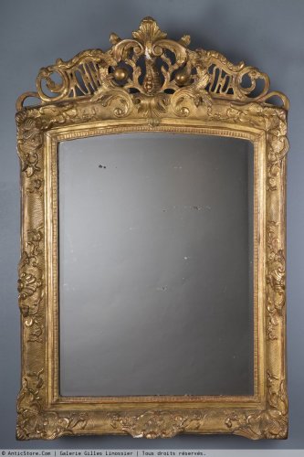 Antiquités - Miroir en bois doré d'époque Régence