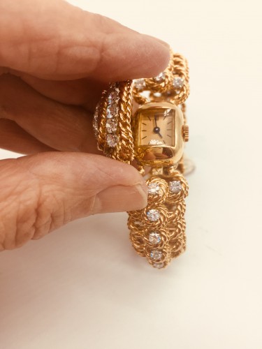 Bijouterie, Joaillerie Bracelet - Bracelet montre en or et diamants signé REGNIER vers 1960