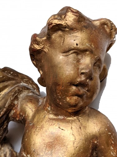 XVIIIe siècle - Paire d'anges rococo en bois doré du XVIIIe siècle