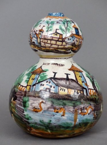 Céramiques, Porcelaines  - Gourde en faïence d'Ancy le Franc d'époque Empire