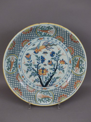 Céramiques, Porcelaines  - Un plat en faïence de Rouen Fabrique Guillibaud 18e siècle