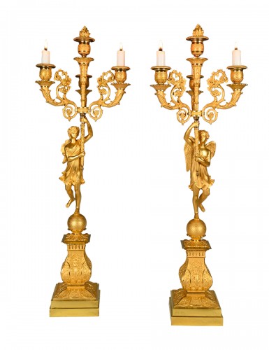 Paire de chandeliers  à quatre lumières en bronze doré vers 1825