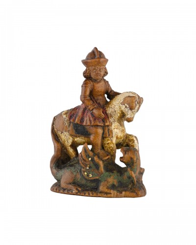 Pièce d'échecs miniature représentant Saint Georges terrassant le dragon
