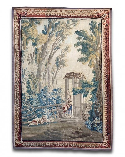 Famille de tapisserie pastorale dans un jardin boisé. Aubusson, vers 1760-1770.