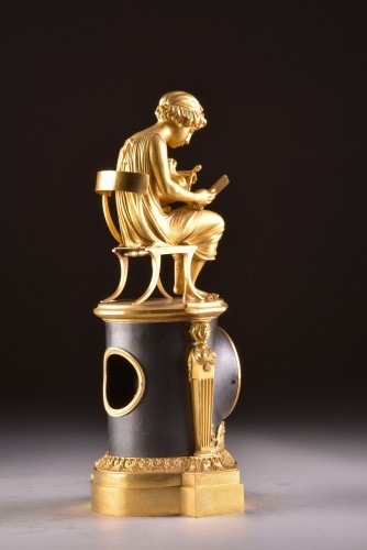 Empire - Pendule Empire en bronze doré et patiné circa 1810