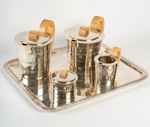 Jean Puiforcat Tea-Coffee service in solid silver and its metal tray - 