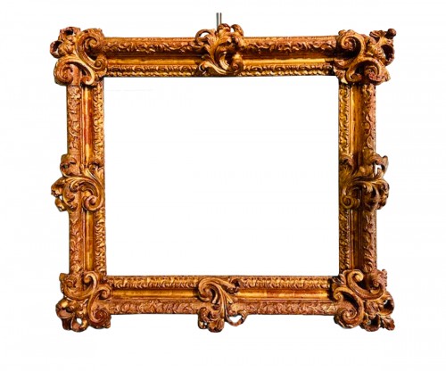 Carved and golden wood frame 