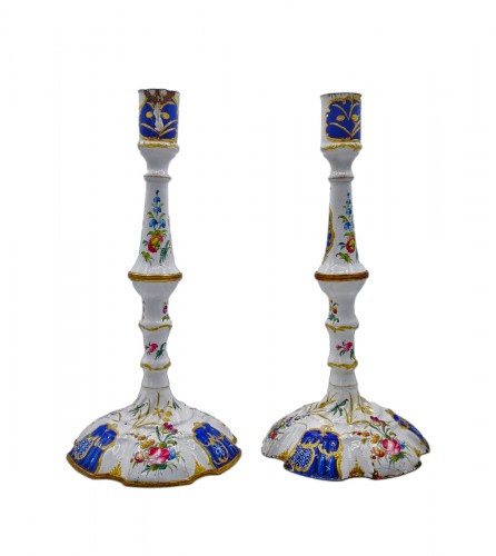 Pair of enamelled copper torches, England 18th century