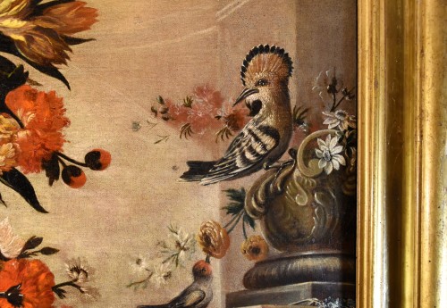 Antiquités - Nature morte aux fleurs, fruits et oiseaux - École italienne du 17e siècle