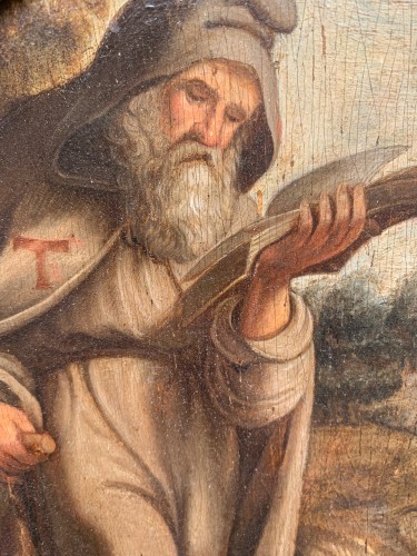 St. Anthony Abbot with pig in a Flemish landscape with church. XVIIth cent - Louis XIII
