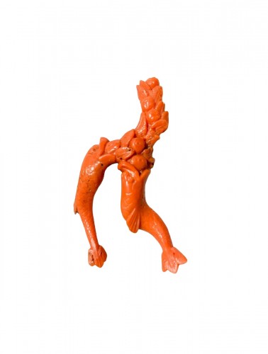 A Carved Coral Amulet With Two Dolphins, 19th Century