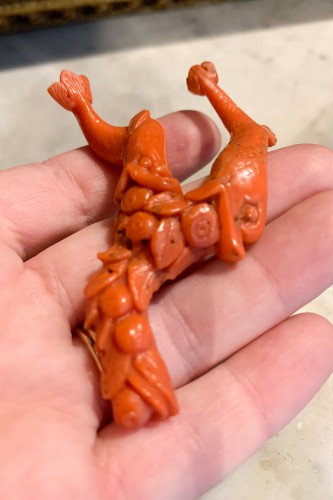  - A Carved Coral Amulet With Two Dolphins, 19th Century
