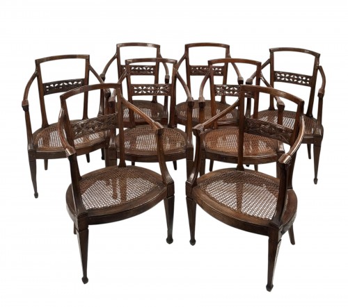 Eight walnut armchairs, Veneto late 18th century
