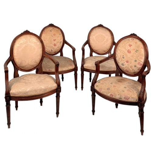 Set of four walnut armchairs, Piedmont late 18th century
