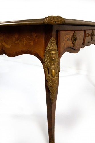  - A desk inlaid with various woods, early 20th century