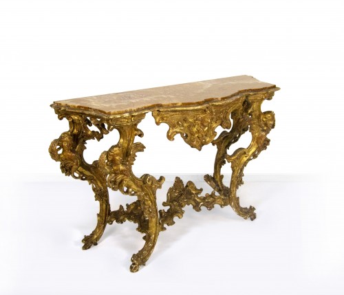 Furniture  - A carved and gilded wooden console table, 18th century