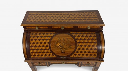 Furniture  - A central roller desk veneered in various woods, France, 20th century