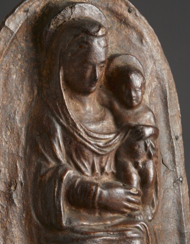 Leather relief depicting the Madonna enthroned with Child on her lap - 