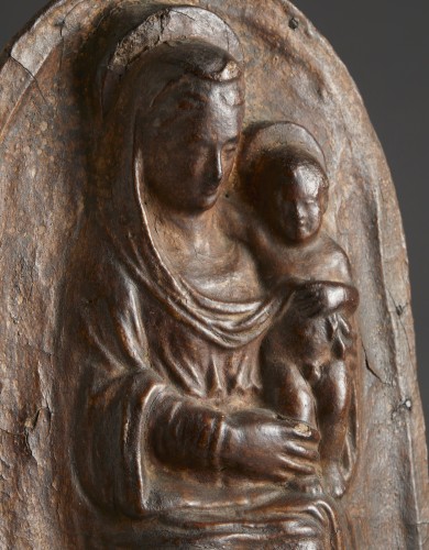 Leather relief depicting the Madonna enthroned with Child on her lap - 