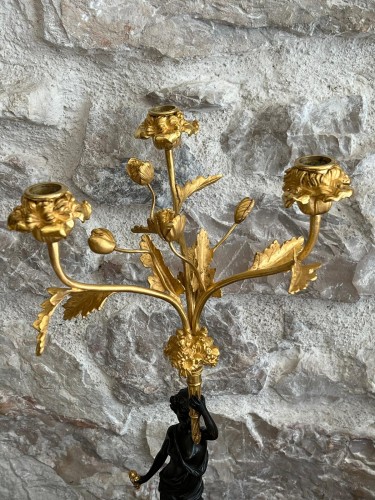  - Pair of patinated and gilt bronze candelabra, early 19th century