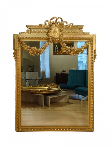 Large gilded mirror with woman's profile - Late 19t century
