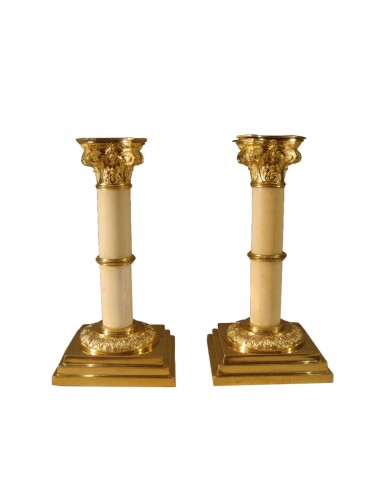Pair of small bronze and ivory table candlesticks