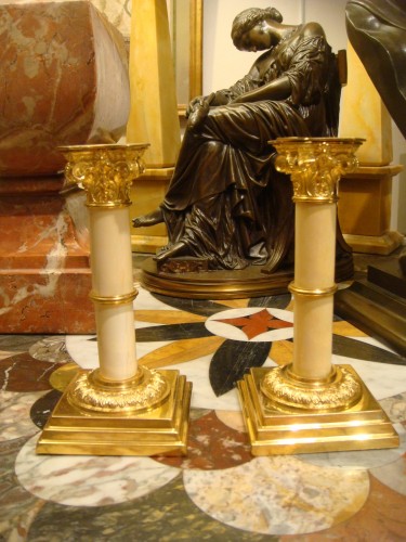  - Pair of small bronze and ivory table candlesticks