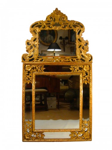 Miroir Louis XV à parecloses en bois doré