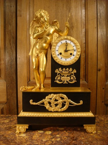 Pendule en brun et bronze doré Cupidon - Epoque Restauration - Horlogerie Style Restauration - Charles X